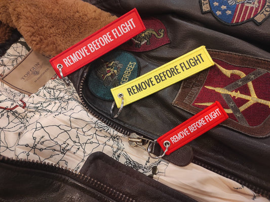 REMOVE BEFORE FLIGHT PORTACHIAVI